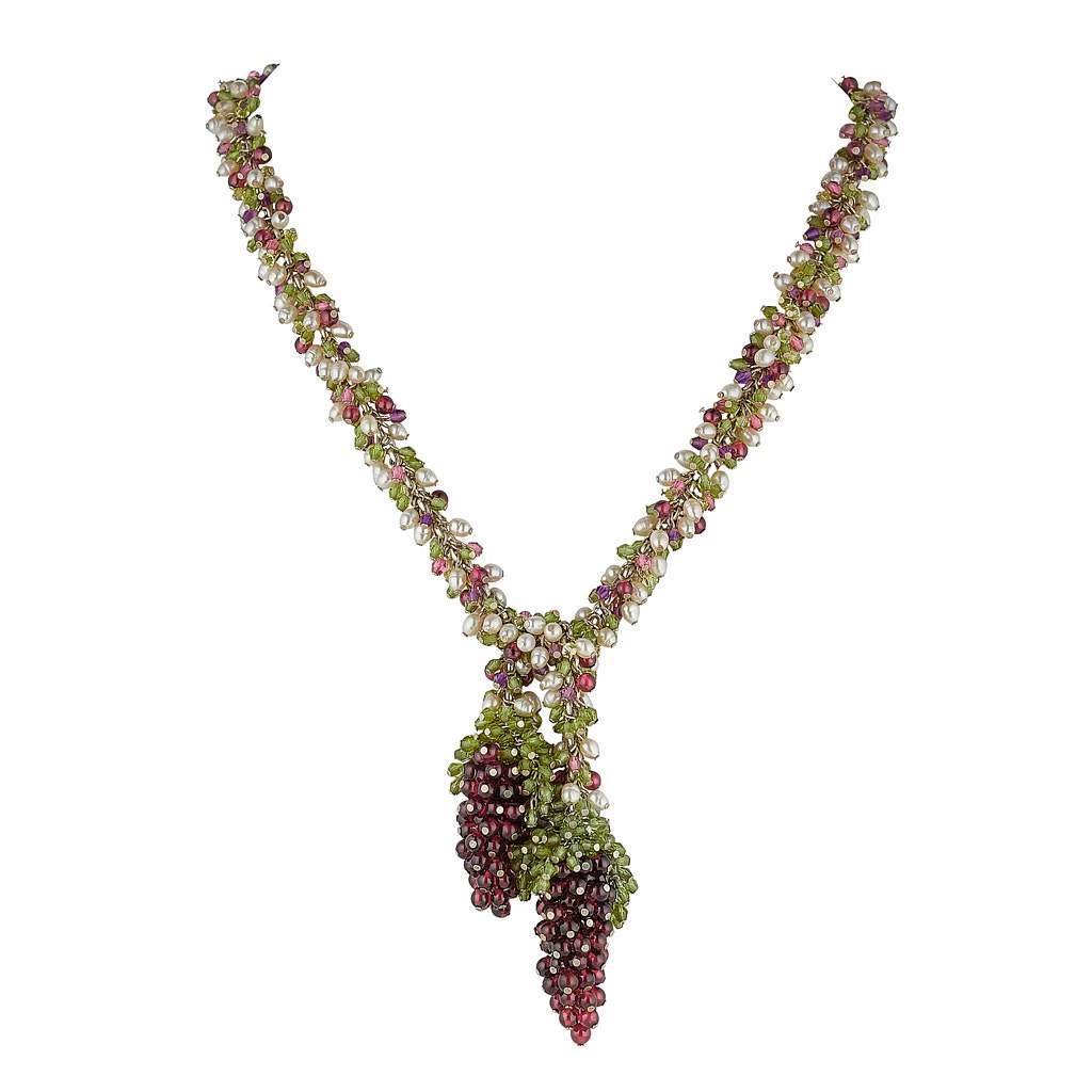 Pearl chain necklace with multi coloured stones and two large red grapes with green leaves at each end.