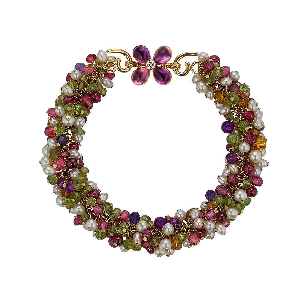 Multi coloured stone bracelet made in gold with purple flower and diamond.