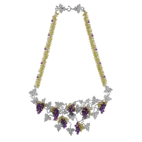 Silver grapevine necklace with purple grapes, green leaves and silver leaf clasp.